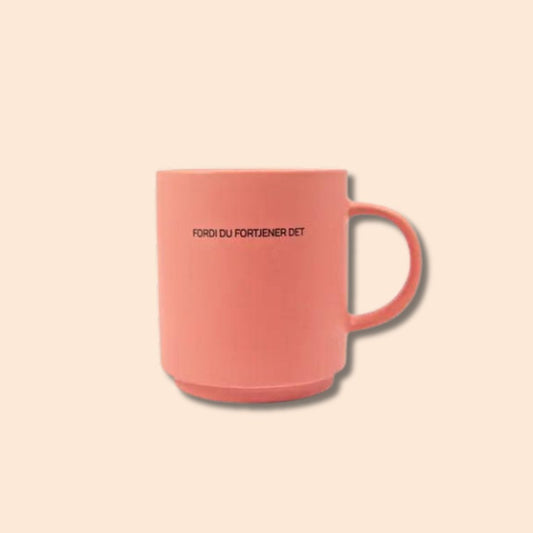 Cup with the text "Because you deserve it"